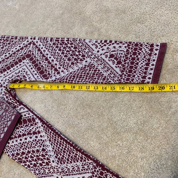 Fabletics High-Waisted Seamless Lace Capri Leggings Burgundy and Sand - Picture 8 of 13